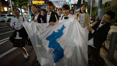 Koreans in Japan celebrate the  summit in a rally Friday. 
