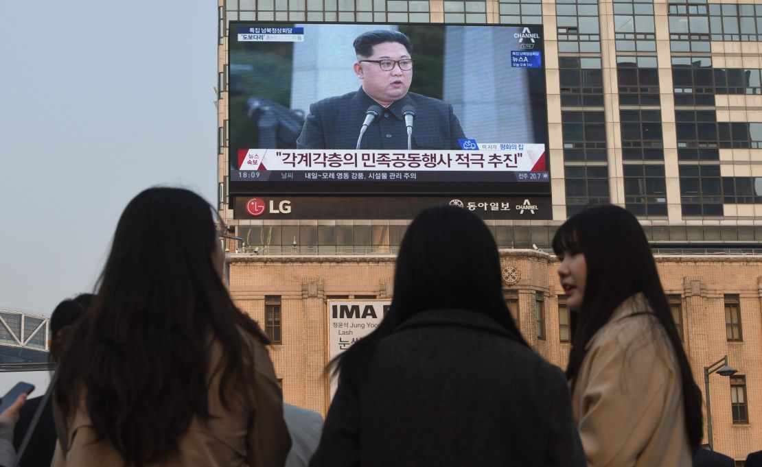 A big screen in Seoul shows live footage of Kim and Moon's joint news conference Friday.