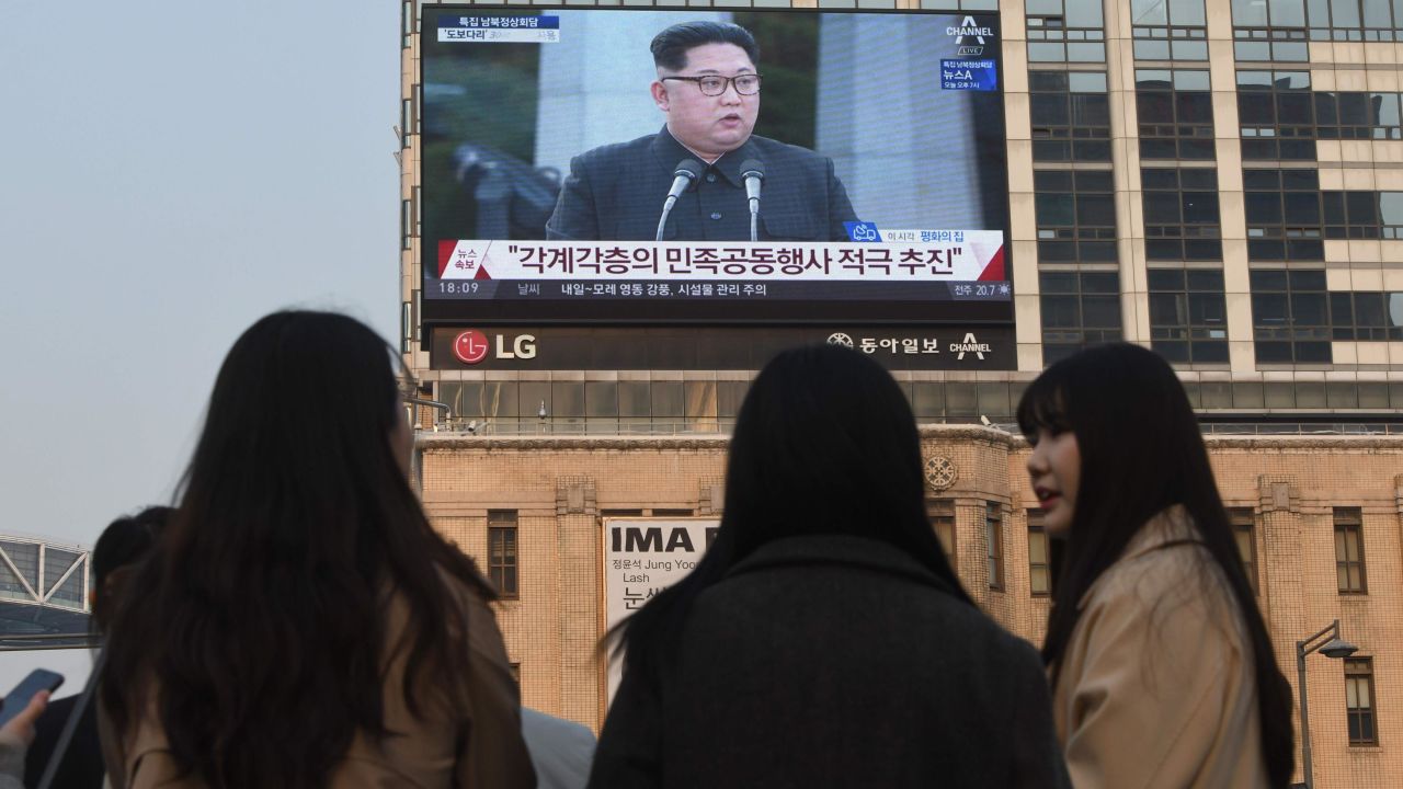 A big screen in Seoul shows live footage of Kim and Moon's joint news conference Friday.