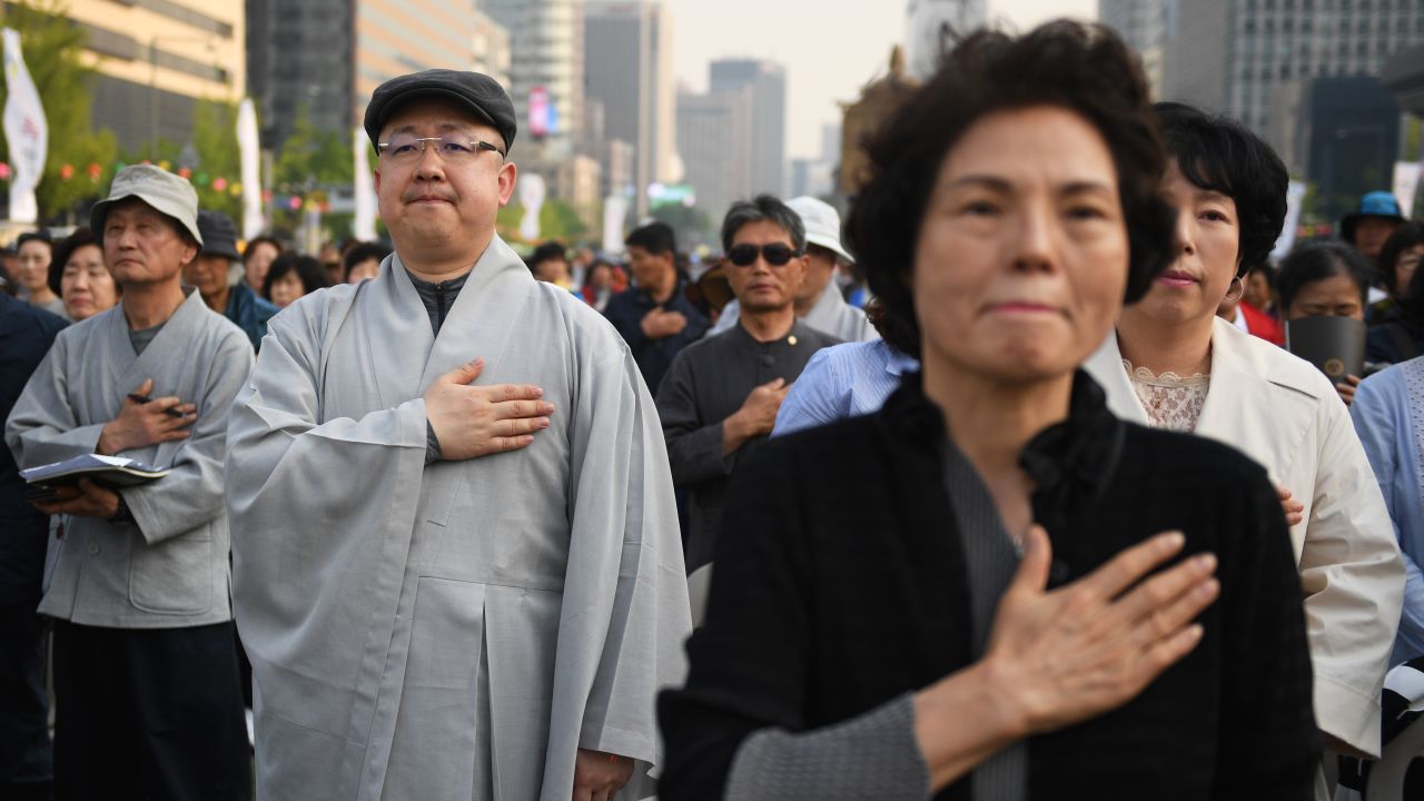South Koreans pray Friday in Seoul for the success of the inter-Korean summit.