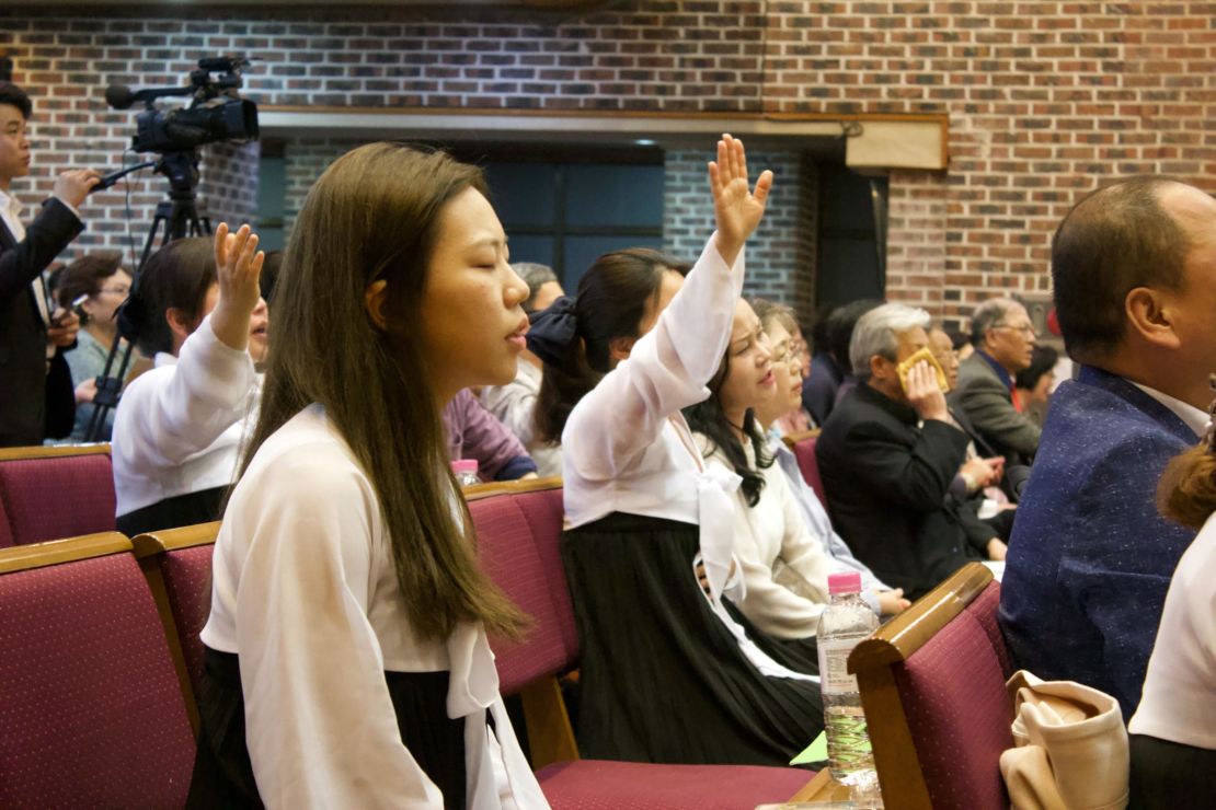 North Korean refugees sing and pray during a church service in Seoul, South Korea on April 28, 2018.
