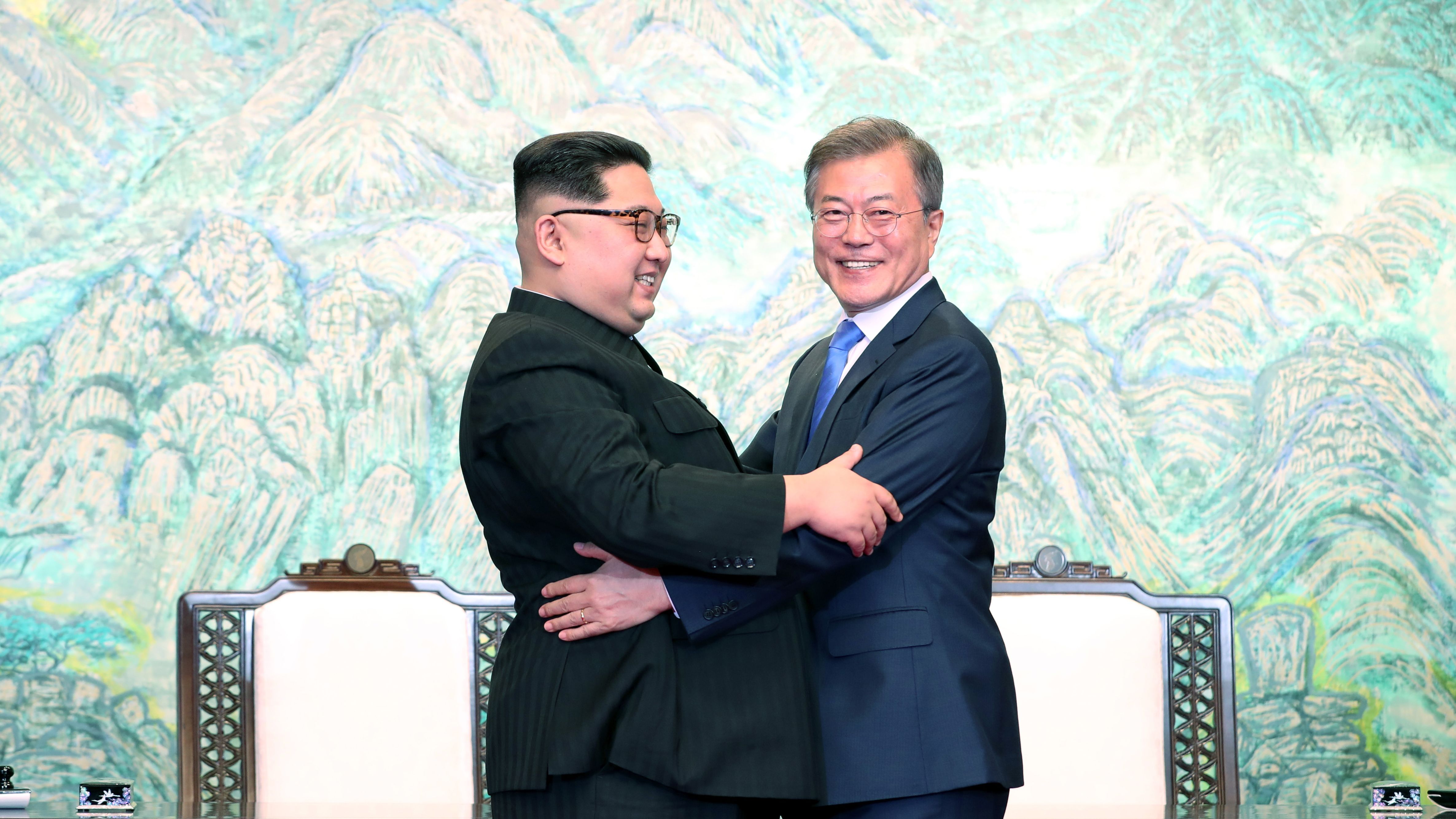 North Korean leader Kim Jong Un and South Korean President Moon Jae-in  embrace at a summit in South Korea in April.