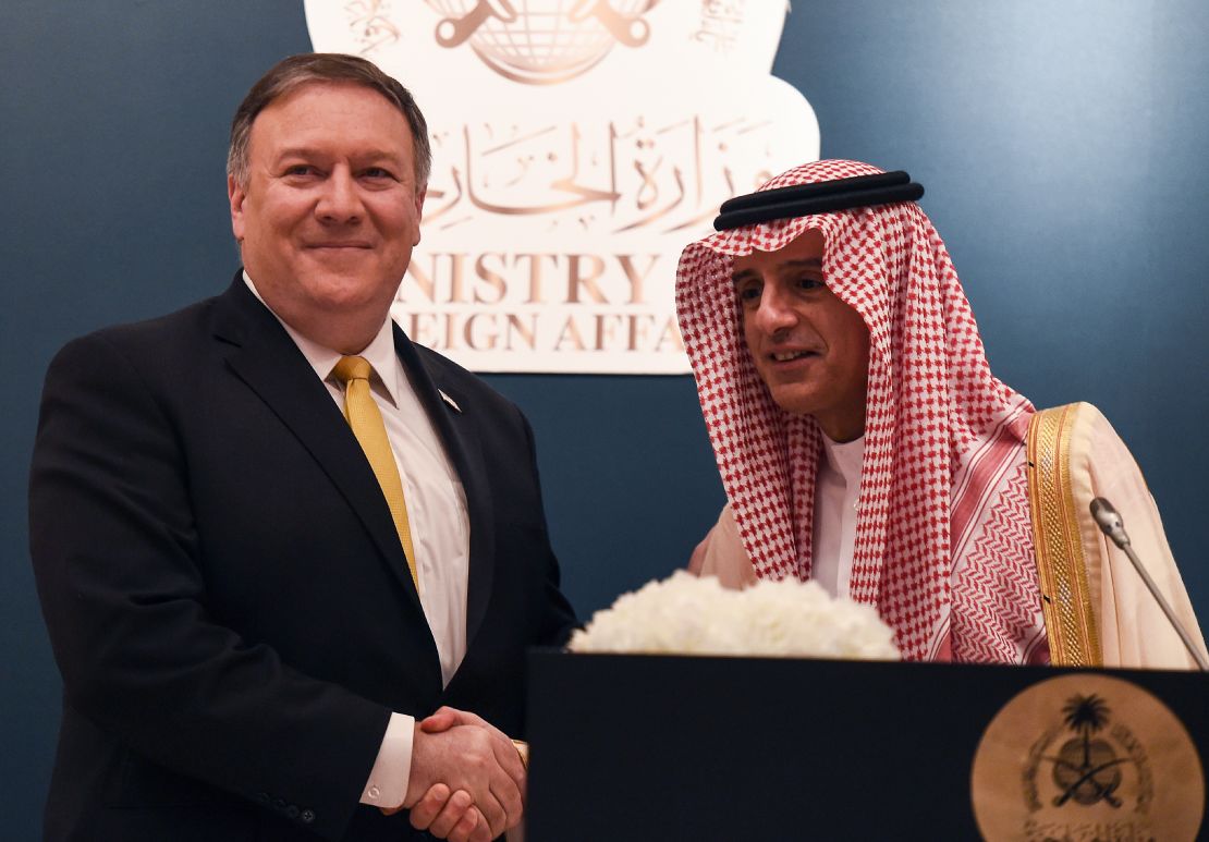 Saudi Foreign Minister Adel al-Jubeir shakes hands with US Secretary of State Mike Pompeo during a joint press briefing at the Royal airport in the capital Riyadh.