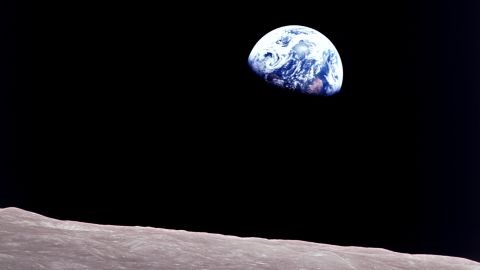 Apollo 8 astronaut Bill Anders took this breathtaking photo of the "Earthrise" over the moon's landscape. 