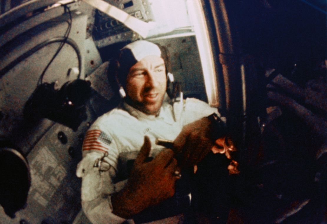 Navigator Jim Lovell works inside Apollo 8's cramped quarters. 