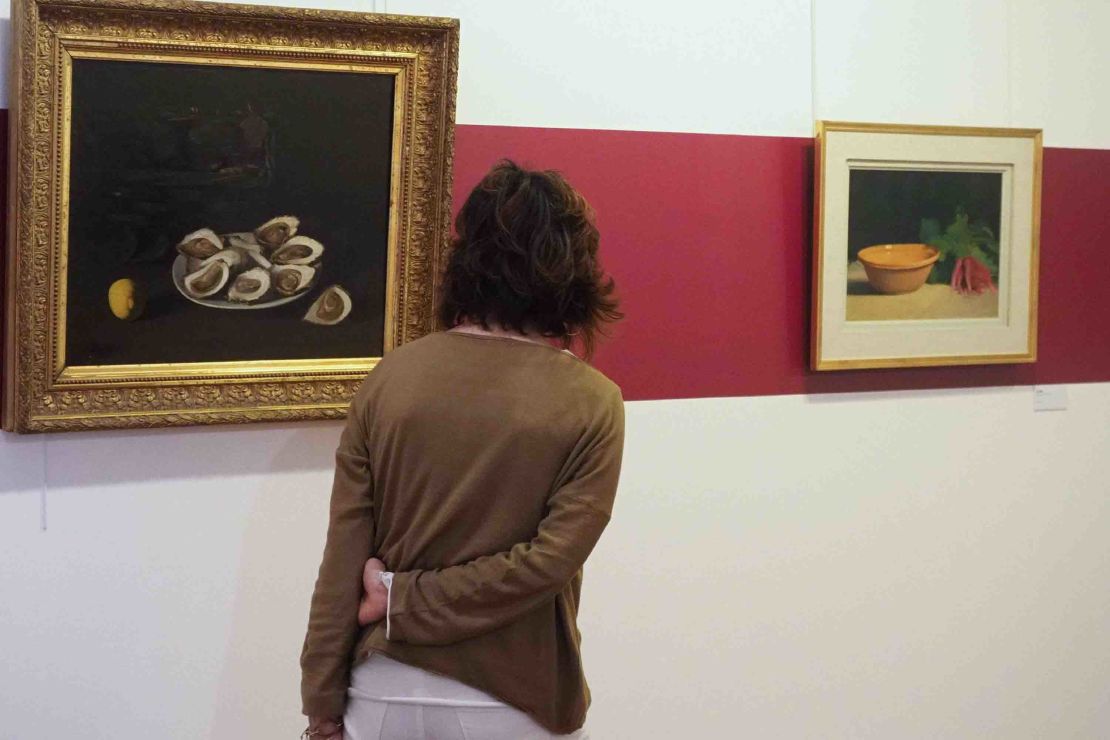 A visitor looks at painting by painter Etienne Terrus at the museum dedicated to the artist in Elne, France. 