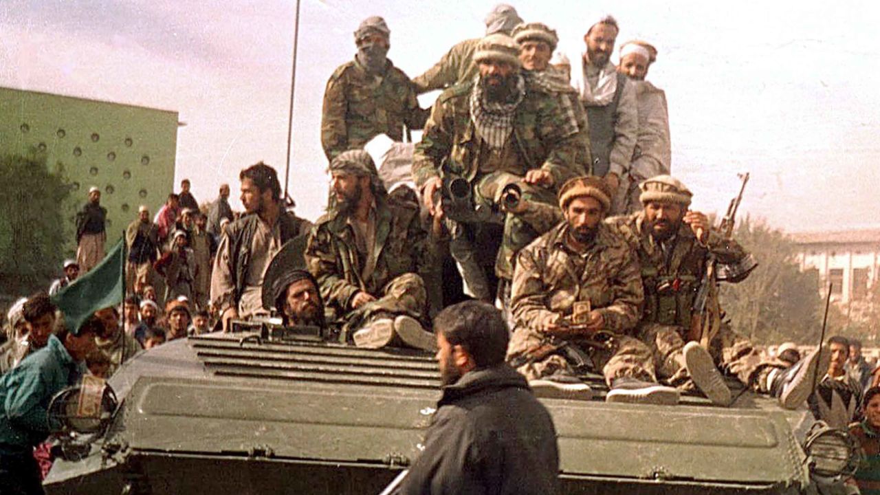 Security forces from the Northern Alliance enter Kabul on November, 13, 2001.