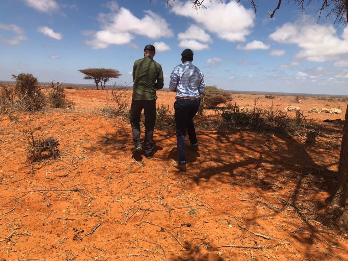 John Horgan, left, and Iftiin Foundation Director Mohamed Ali visit an area outside Kismayo, Somalia.