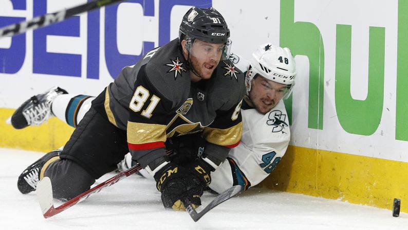 Vegas' Jonathan Marchessault, left, and San Jose's Tomas Hertl eye the puck during an NHL playoff game on Saturday, April 28.  