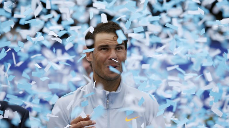 Confetti falls around Rafael Nadal after the Spaniard <a href="index.php?page=&url=http%3A%2F%2Fbleacherreport.com%2Farticles%2F2773290-rafael-nadal-beats-stefanos-tsitsipas-to-win-2018-barcelona-open-banc-sabadell" target="_blank" target="_blank">won the Barcelona Open</a> on Sunday, April 29. It was the 11th time Nadal won the tournament.