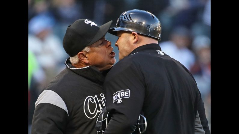 Rick Renteria, the manager of the Chicago White Sox, argues with home plate umpire Mike Estabrook after being thrown out of the game on Tuesday, April 24. Renteria was ejected for arguing a called third strike at the end of the sixth inning.
