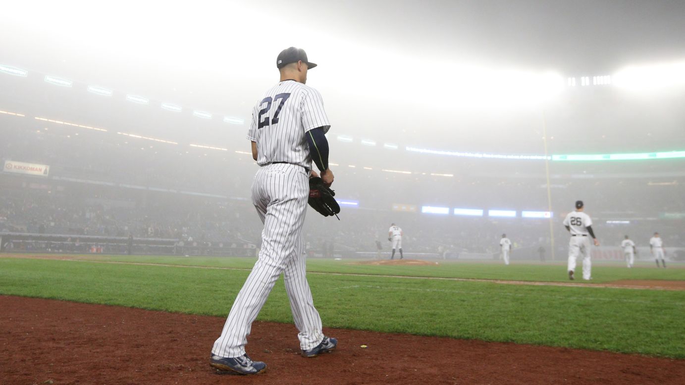 New York Yankees slugger Giancarlo Stanton takes the field during a foggy home game against Minnesota on Wednesday, April 25.