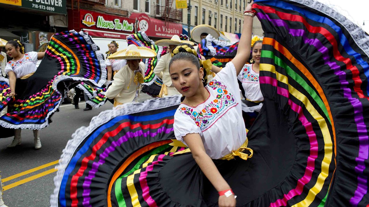 BROOKLYN, NY - MAY 7: Brooklyn's Mexican community marches down 5th Avenue in the Sunset Park neighborhood during a Cinco de Mayo parade on May 7, 2017 in Brooklyn, New York. The holiday, which commemorates a Mexican military victory over the French, has taken on an importance in the Mexican American communities across the United States that it does not have in Mexico itself. (Photo by Andrew Lichtenstein/Corbis via Getty Images)