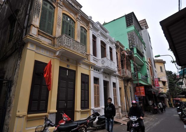 A row of restored shophouses in Hanoi's Old Quarter.