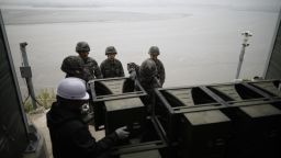 TOPSHOT - South Korean soldiers dismantle loudspeakers that were set up for propaganda broadcasts near the demilitarized zone separating the two Koreas in Paju on May 1, 2018. - South Korea silenced its battery of giant loudspeakers that blast messages at the North's soldiers on the border, in a conciliatory gesture after the historic inter-Korea summit. (Photo by KIM HONG-JI / AFP)        (Photo credit should read KIM HONG-JI/AFP/Getty Images)