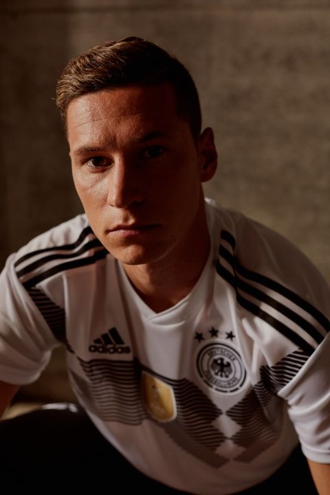 For Germany, Adidas looked to the past. The horizontal graphic printed across the chest recalls the uniform won by the German team that won the 1990 World Cup team. The gold crest symbolizes the defending champs' victory in 2014. 