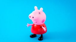 Borgosesia, Italy - June 14, 2013: A figurine toy of Peppa Pig, a character from "Peppa Pig" children's animated television series by Astley Baker Davies and distributed by E1 Kids.