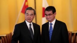 Japan's Foreign Minister Taro Kono (R) poses with his Chinese counterpart Wang Yi (L) at the start of their meeting in Tokyo on April 15, 2018.
Wang Yi arrived in Tokyo for a visit seen as a sign of a gradual thaw between the Asian rivals, amid flurries of diplomacy over North Korea. / AFP PHOTO / POOL / Behrouz MEHRI        (Photo credit should read BEHROUZ MEHRI/AFP/Getty Images)