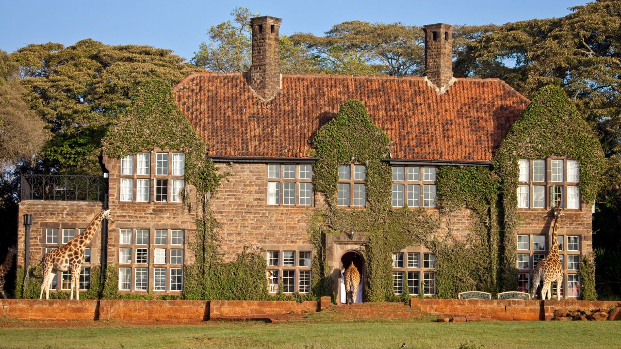 <strong>Giraffe Manor, Nairobi:</strong> This 12-room manor feels more like a country house with its grand fireplaces and sunny terraces, not to mention giraffes that swoop their heads inside the dining room to swipe your breakfast.