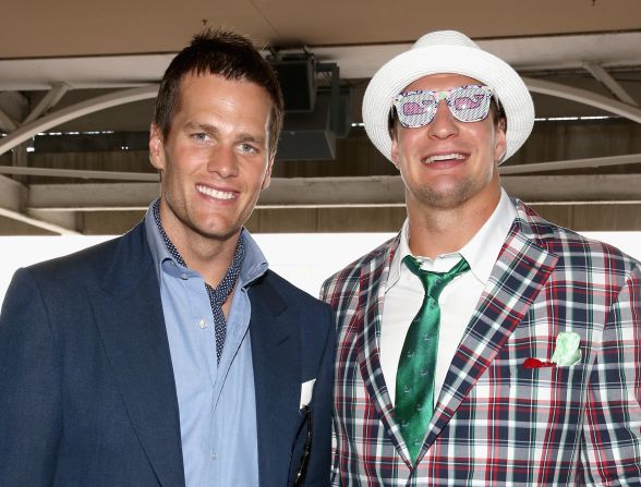 Famous faces regularly flock to Churchill Downs for the Derby. Here, NFL stars Tom Brady and Rob Gronkowski soak up the atmosphere in 2015. A horse named after New England Patriot's tight end Gronkowski was due to run in this year's race, but <a href="index.php?page=&url=https%3A%2F%2Fedition.cnn.com%2F2018%2F04%2F24%2Fsport%2Fkentucky-derby-gronkowski-horse-racing-nfl-spt%2Findex.html">had to pull out with a fever</a>.