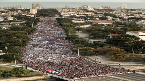 People march to Revolution Square in Havana, Cuba, during the annual May Day parade.