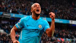 TOPSHOT - Manchester City's Belgian defender Vincent Kompany celebrates scoring the opening goal during the English Premier League football match between Manchester City and Manchester United at the Etihad Stadium in Manchester, north west England, on April 7, 2018. / AFP PHOTO / Ben STANSALL / RESTRICTED TO EDITORIAL USE. No use with unauthorized audio, video, data, fixture lists, club/league logos or 'live' services. Online in-match use limited to 75 images, no video emulation. No use in betting, games or single club/league/player publications.  /         (Photo credit should read BEN STANSALL/AFP/Getty Images)
