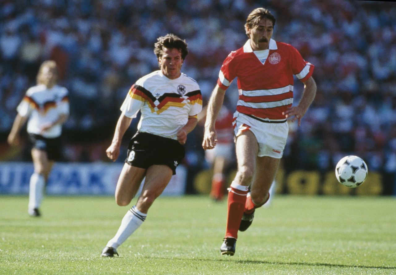 During the 1980s, the colors of Germany's flag started creeping into its usual black and white designs. It became one of the most famous kits of all time when Germany won its third World Cup in the final against Argentina in 1990.