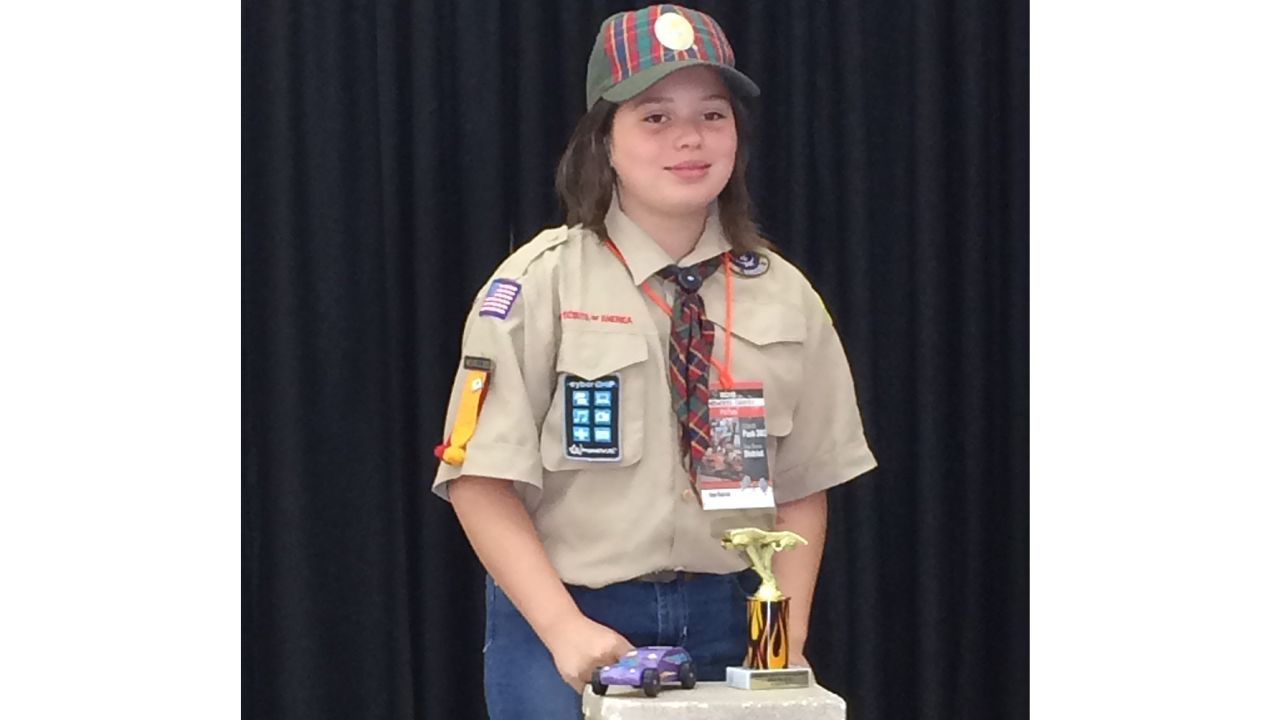 Ana won an award at the Pinewood Derby event.