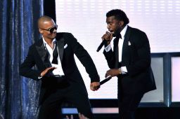 Rappers T.I. (L) and Kanye West perform during the 51st Annual Grammy Awards in 2009. 