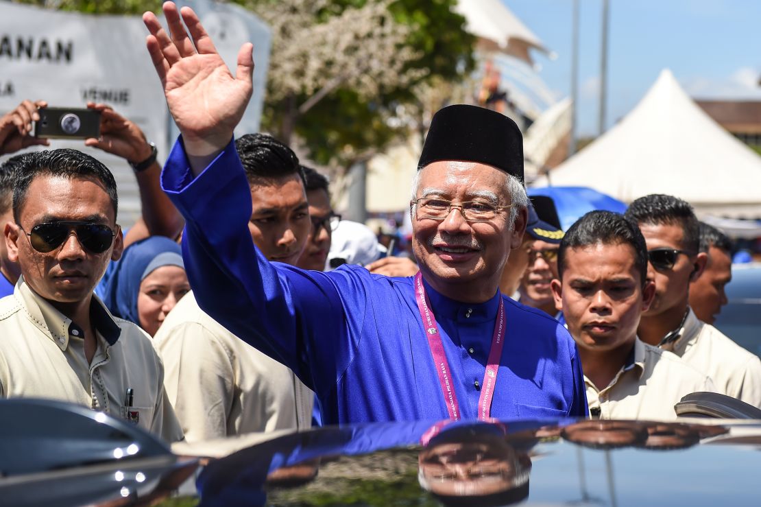 Malaysian Prime Minister Najib Razak waves to supporters during a campaign rally, April 28, 2018.