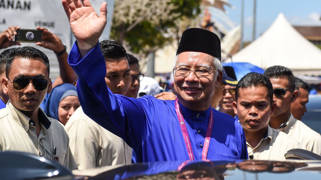 Malaysian Prime Minister Najib Razak waves to supporters during a campaign rally, April 28, 2018.