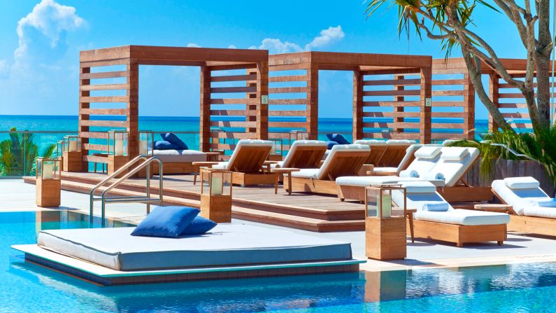 <strong>1 Hotel South Beach:</strong> The property has a 30,000 square feet center pool as well as an adults-only pool on the top floor as well as 600 feet of beach frontage with chairs, loungers, and waiter service.