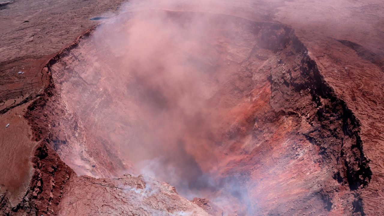 A plume of ash rises Thursday from the Puu Oo vent in this photo released by the US Geological Survey.