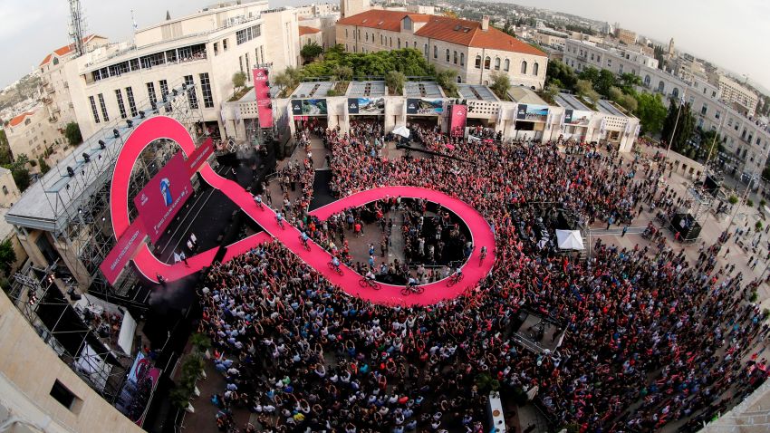 The Israel Cycling Academy team greets the audience during the team presentation of the 101st edition of the Giro d'Italia (Tour of Italy) championship on May 3, 2018 in Jerusalem. (Photo by LUK BENIES / AFP)        (Photo credit should read LUK BENIES/AFP/Getty Images)