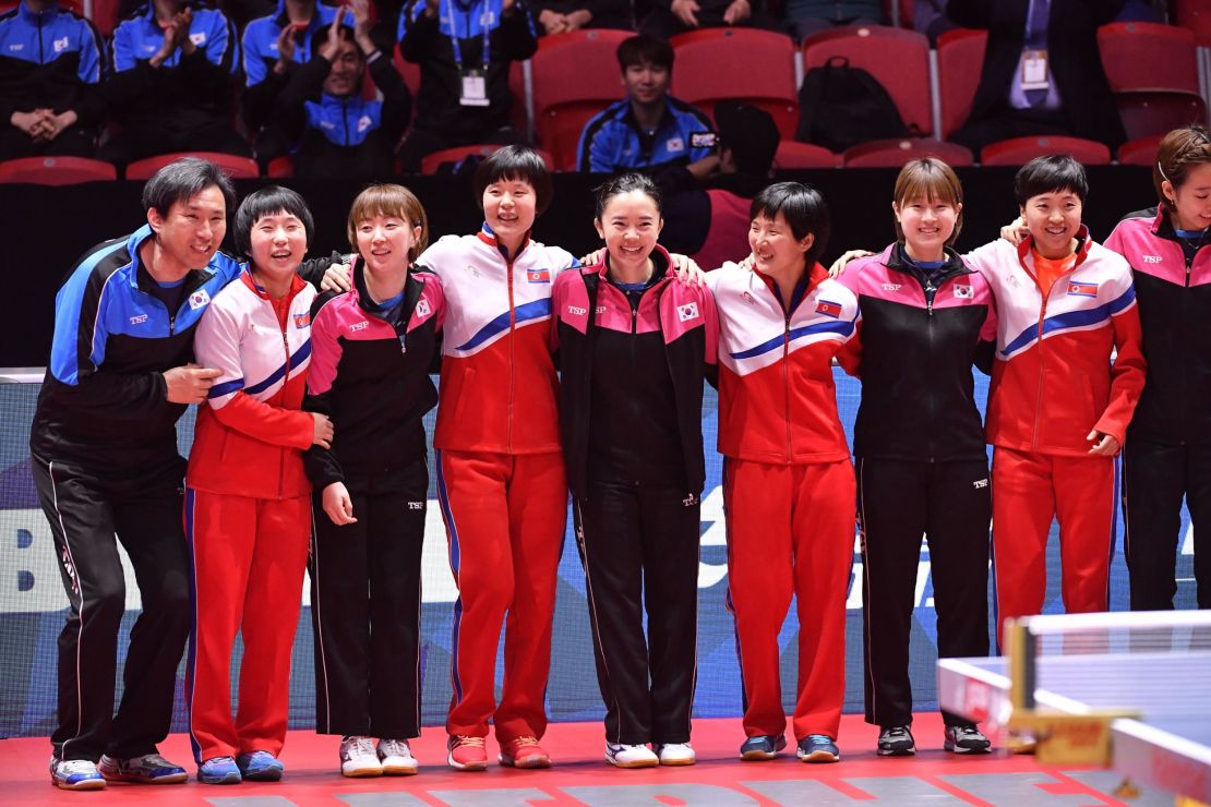 North Korea and South Korea players pose together at the Table Tennis World Championships