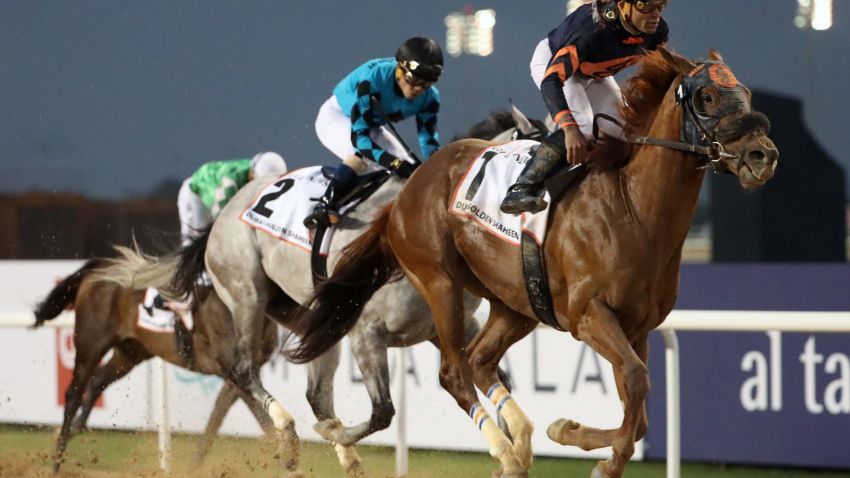 Jockey Joel Rosario rides Mendelssohn (R) before winning the  Dubai Golden Shaheen horse race at the Dubai World Cup in the Meydan Racecourse on March 31, 2018 in Dubai. / AFP PHOTO / KARIM SAHIB        (Photo credit should read KARIM SAHIB/AFP/Getty Images)