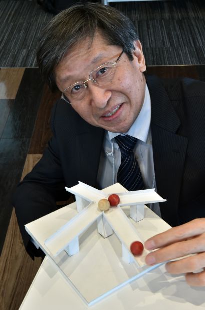Kokichi Sugihara with one of his illusions in Tokyo, in 2015.