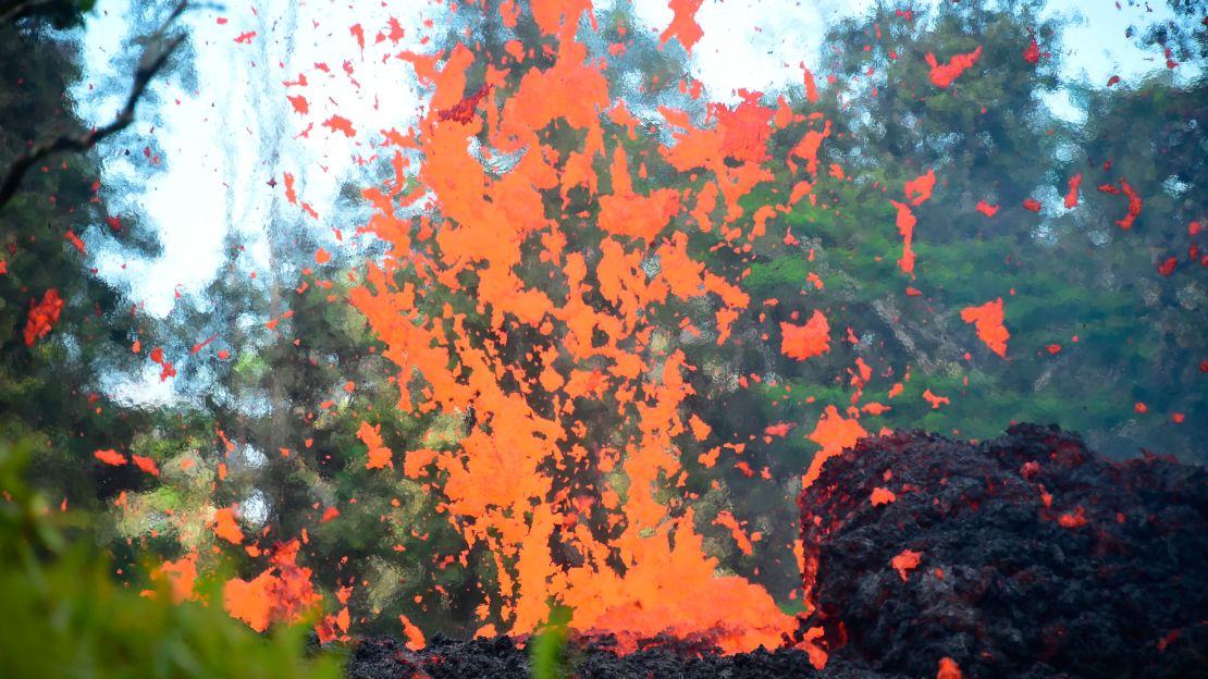 Lava is seen coming from a fissure in the Leilani Estates subdivision on Hawaii's Big Island on May 4, 2018.