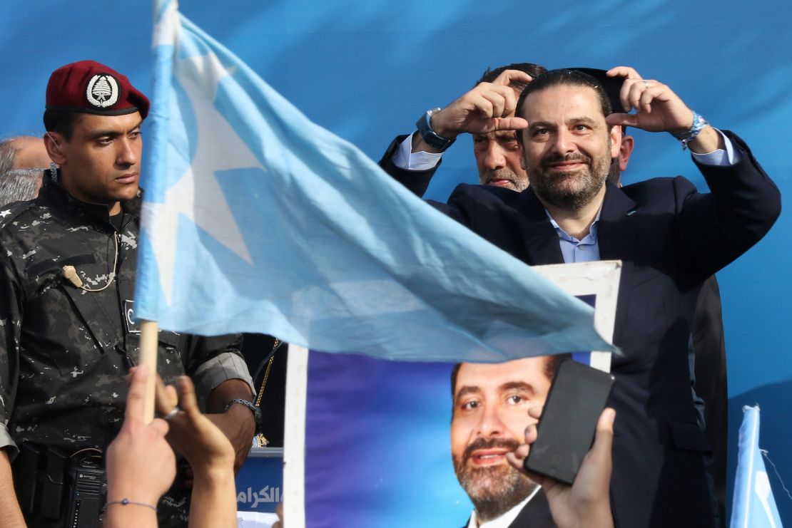 Prime Minister Saad Hariri gestures on stage during a campaign rally in Sidon, Lebanon.