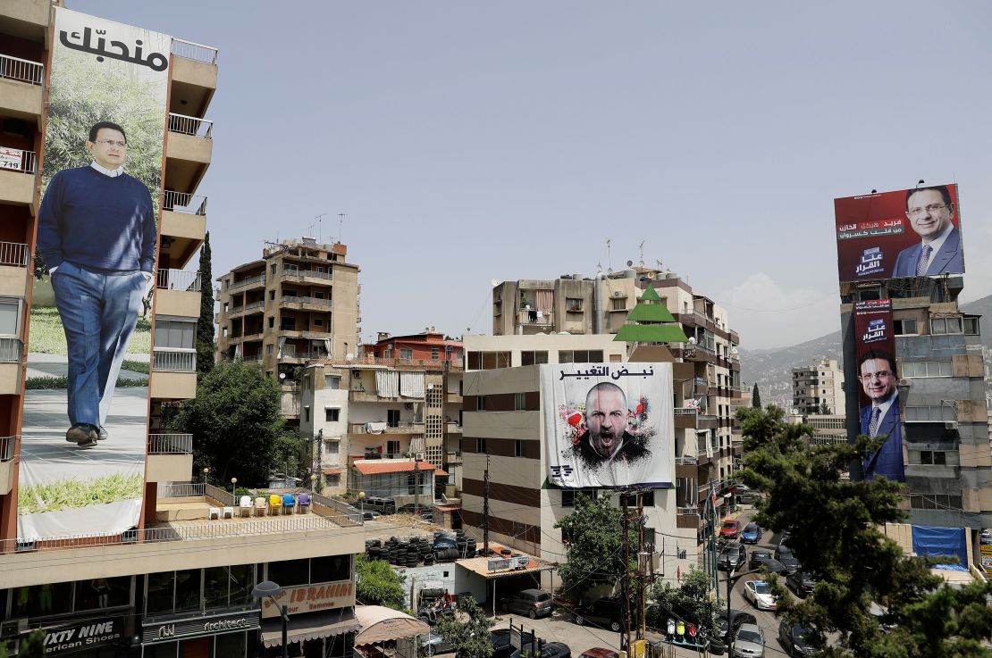 Posters of candidates for the upcoming Lebanese parliamentary elections hang on buildings in northern Beirut.