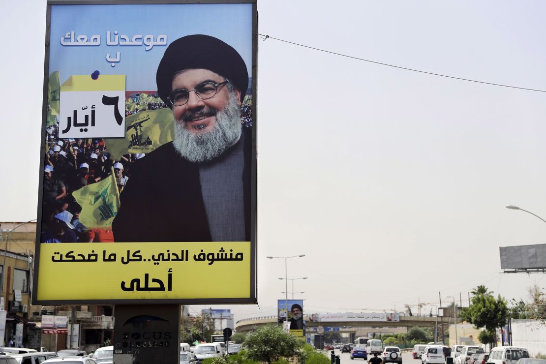 A portrait of Hezbollah leader Hassan Nasrallah is fixed on the side of a road in the mainly Shiite Muslim southern suburbs of Beirut.