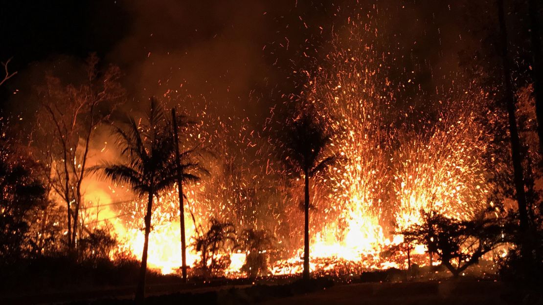 A lava fountain shoots up into the air in Hawaii.