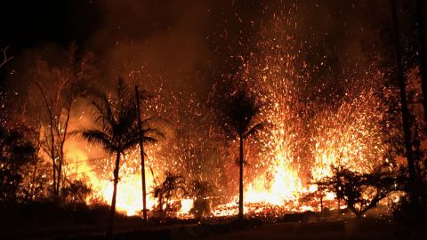 Lava fountains spray out of  a new fissure in the Leilani Estates neighborhood that erupted the evening of May 5, 2018.