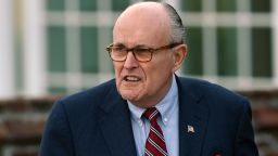 FILE - In this Nov. 20, 2016 file photo, former New York Mayor Rudy Giuliani arrives at the Trump National Golf Club Bedminster clubhouse in Bedminster, N.J. President Donald Trump's new lawyer Rudy Giuliani said Wednesday, May 2, 2018, the president repaid attorney Michael Cohen for a $130,000 payment to porn star Stormy Daniels. Giuliani made the revelation during an appearance on Fox News Channel's "Hannity." (AP Photo/Carolyn Kaster, File)