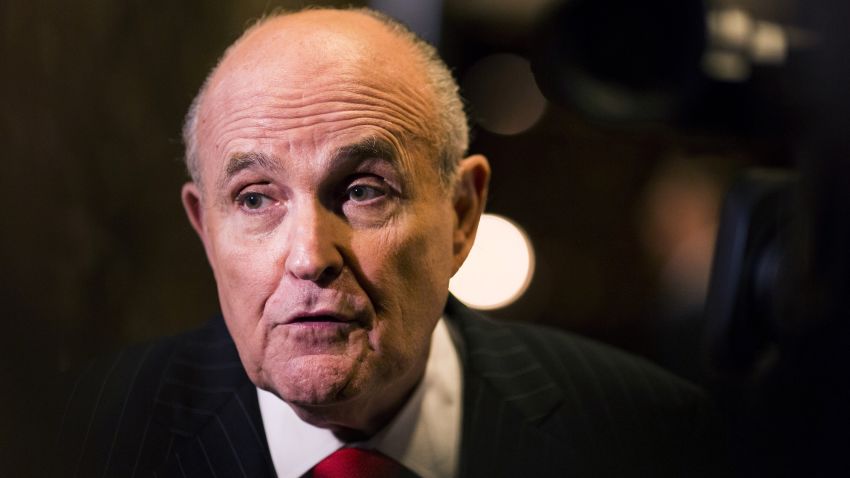Rudolph Giuliani, former mayor of New York, speaks to members of the media in the lobby of Trump Tower in New York, U.S., on Thursday, Jan. 12, 2017. Giuliani "will be sharing his expertise and insight as a trusted friend" on private-sector cyber security problems, President-elect Donald Trump's transition team said in a statement. Photographer: John Taggart/Bloomberg via Getty Images