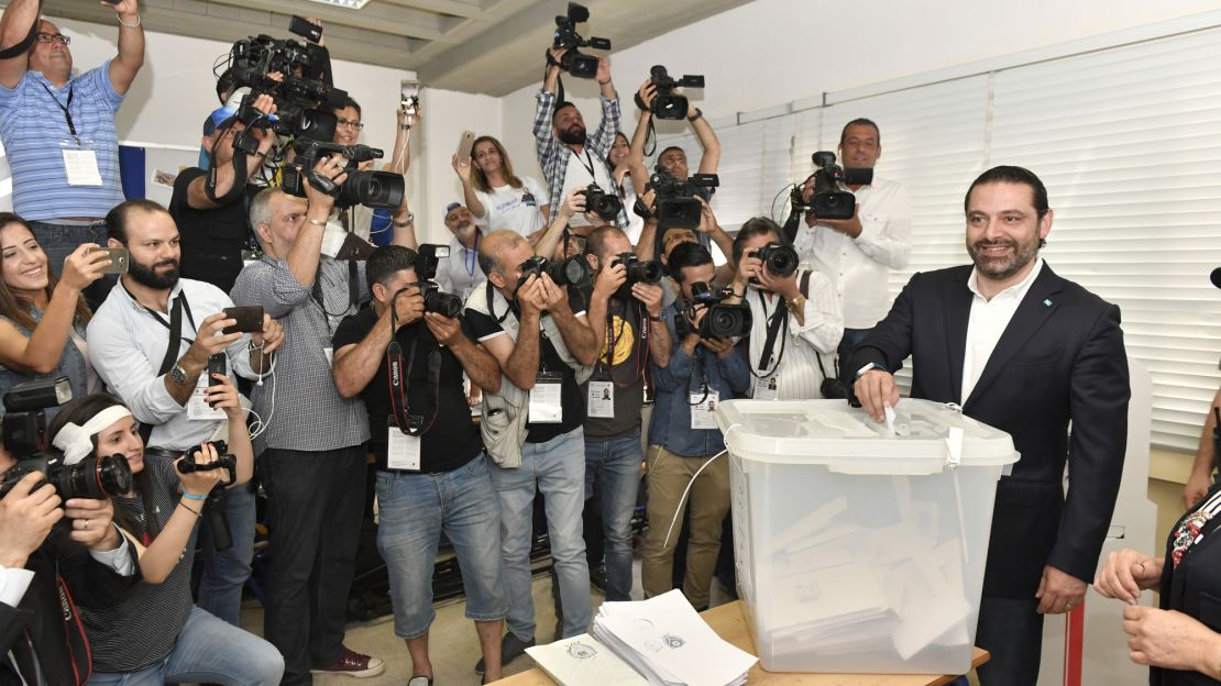 Lebanese Prime Minister Saad Hariri casts his vote at a polling station.