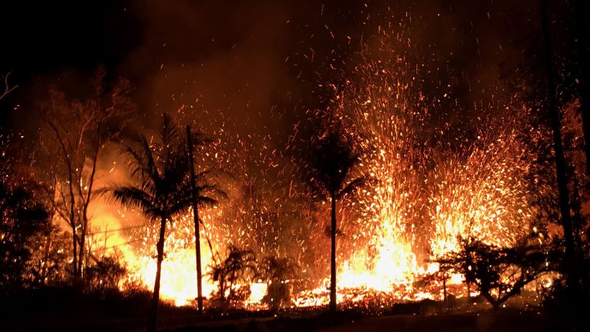 PAHOA, HI - MAY 5: In this handout photo provided by the U.S. Geological Survey, lava errupts from a new fissure from Luana Street after the eruption of Hawaii's Kilauea volcano on May 5, 2018 in the Leilani Estates subdivision near Pahoa, Hawaii. The governor of Hawaii has declared a local state of emergency near the Mount Kilauea volcano after it erupted following a 5.0-magnitude earthquake, forcing the evacuation of nearly 1,700 residents. (Photo by U.S. Geological Survey via Getty Images)