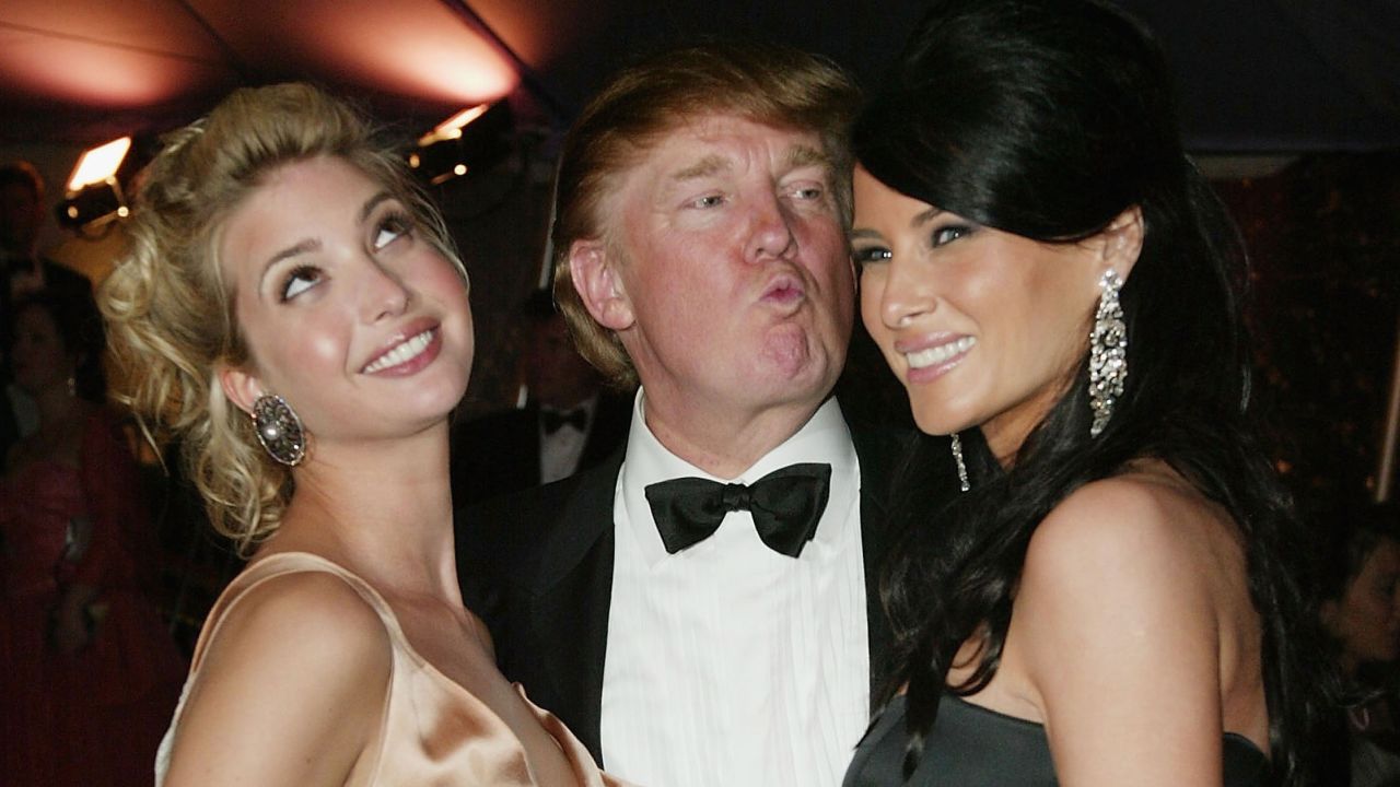 Donald Trump, daughter Ivanka (left) and then-girlfriend Melania Knauss (right) attend the "Dangerous Liaisons: Fashion and Furniture in the 18th Century" gala in 2004.