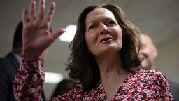 WASHINGTON, DC - Gina Haspel, nominee to be director of the CIA, waves as she arrives at a meeting with US Sen. Joe Manchin (D-WV) May 7, 2018, on Capitol Hill in Washington, DC.