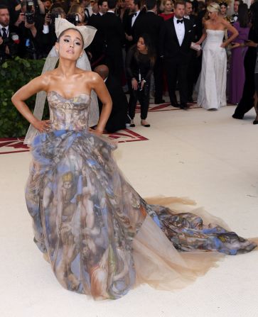 Ariana Grande was wearing a dress designed by Vera Wang.<br />